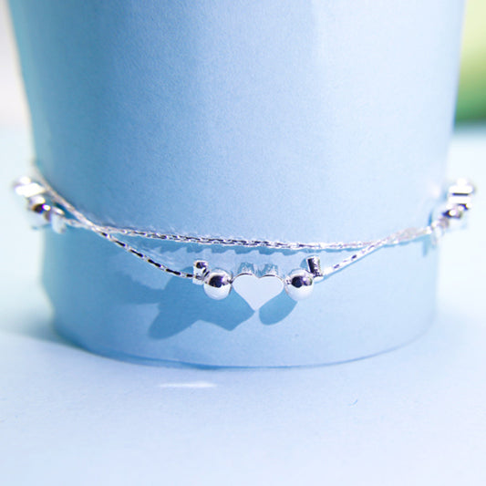LoveLink Double Heart Bracelet β Minimalist White Gold